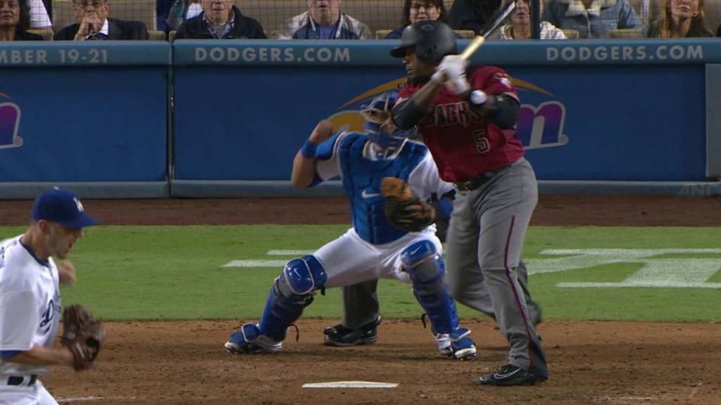 Yasiel Puig flips his bat after a fly ball that doesn't even make the