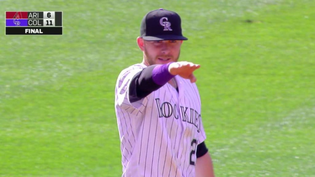 Rockies score 11 runs over 2 innings, rally past Reds 11-6