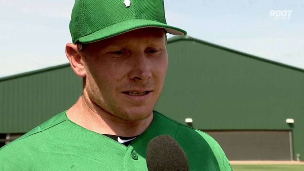 Why are MLB players wearing green hats today?