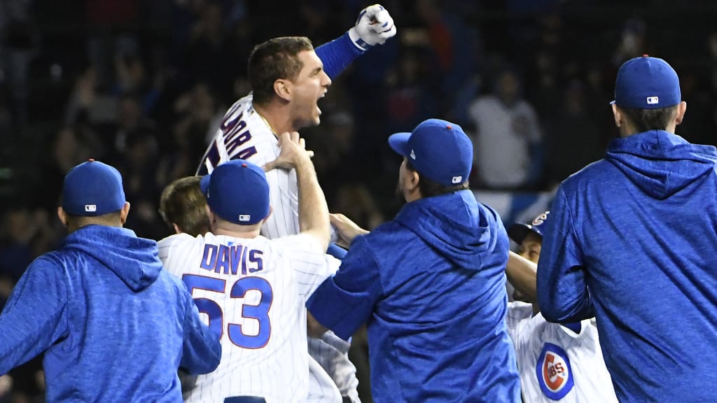 CHICAGO, IL - SEPTEMBER 26: Albert Almora Jr. (top) of the Chicago Cubs celebrates his game-winning walk-off single against the Pittsburgh Pirates during the tenth inning on September 26, 2018 at Wrigley Field in Chicago, Illinois. The Cubs won 7-6. (Photo by David Banks/Getty Images)