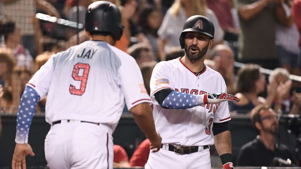 PHOENIX, AZ - JULY 04: Daniel Descalso #3 of the Arizona Diamondbacks congratulates Jon Jay #9 after scoring in the fourth inning of the MLB game against the St. Louis Cardinals at Chase Field on July 4, 2018 in Phoenix, Arizona. (Photo by Jennifer Stewart/Getty Images)