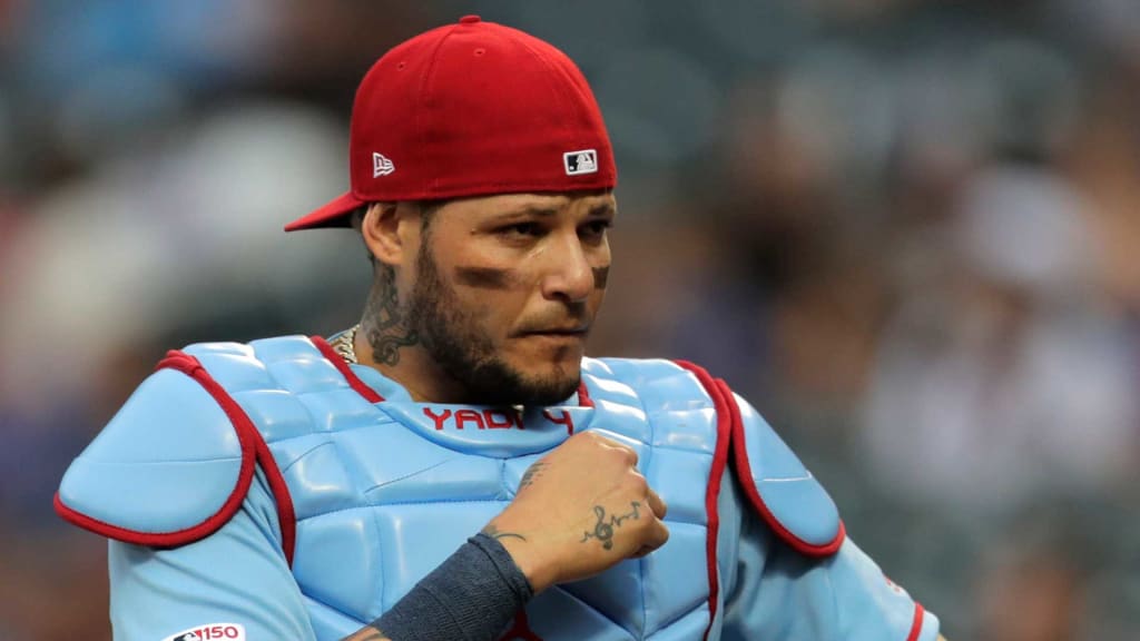 Cardinals catcher Yadier Molina is hit by a pitch in a rehab