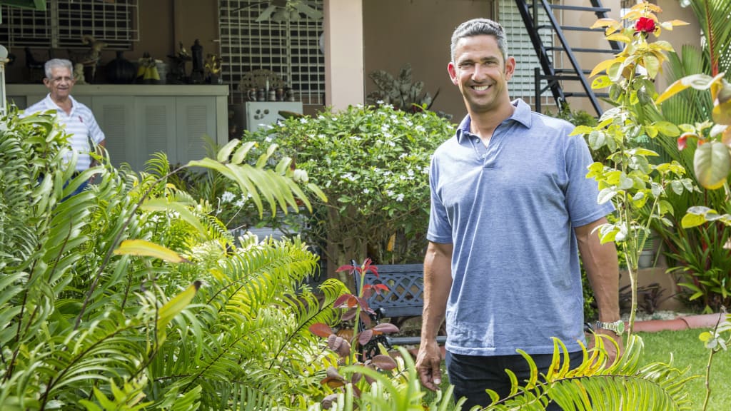 Jorge Posada in his parents’ backyard in Puerto Rico