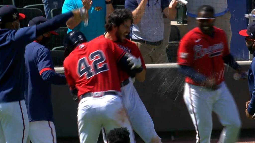 Atlanta Braves shortstop Dansby Swanson drops his helmet after striking out  to end the eighth inning of a baseball game against the Miami Marlins  Monday, April 12, 2021, in Atlanta. (AP Photo/John