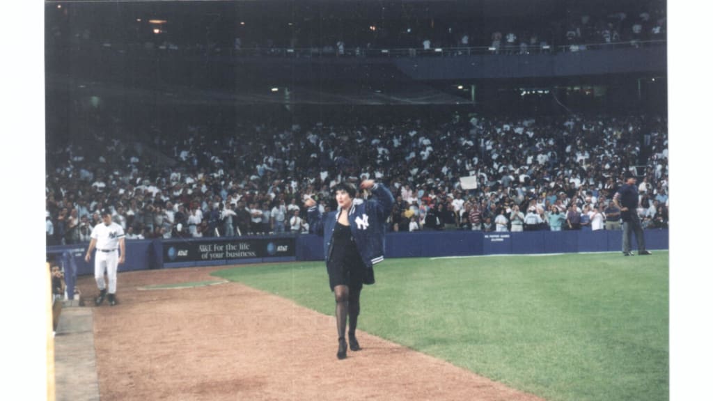 Chita Rivera performs on Macarena Night in front of the Yankees dugout. (Photo by Merle Frimark)