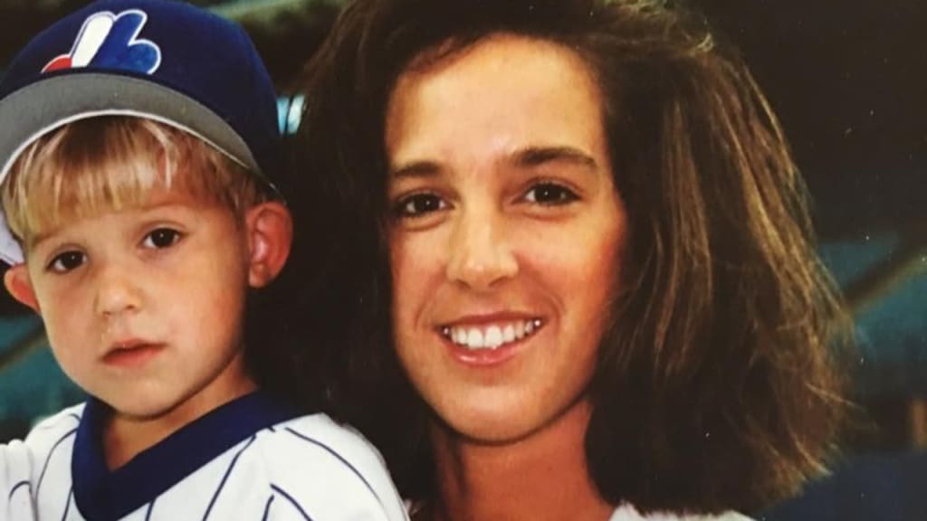 A young Travis Shaw poses with his mother, Julie. (Photo courtesy of Shaw family)