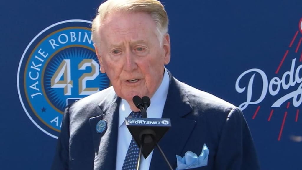 Vin Scully tells a story about Dodgers all wearing 42 to protect Jackie  Robinson