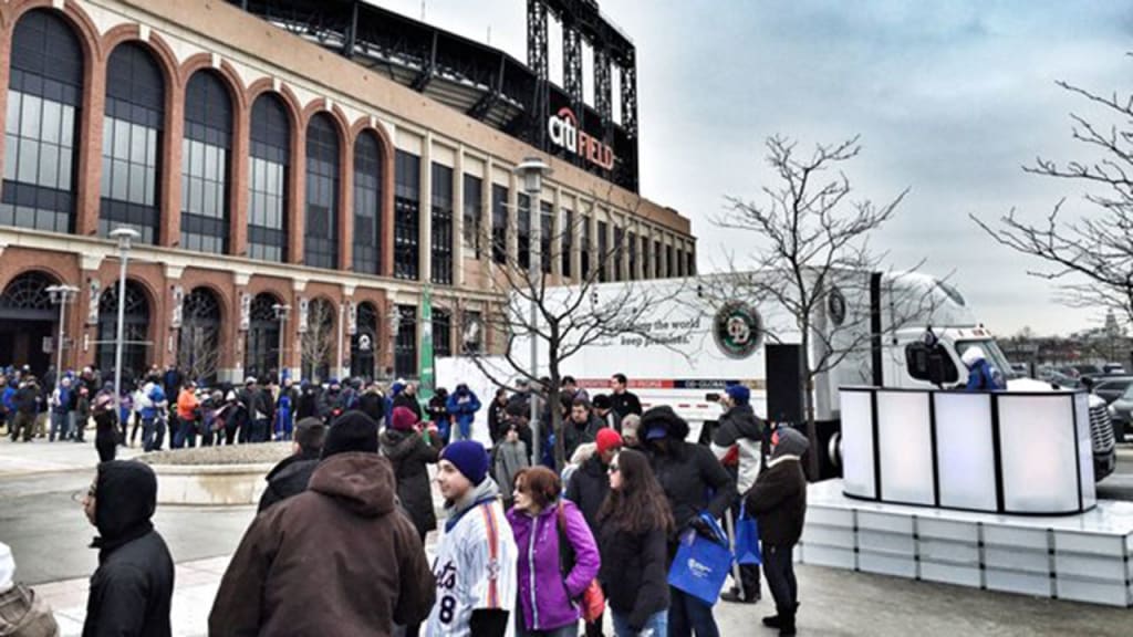 Mets fans gather outside Citi Field as the team sends its final truck to its Spring Training home in Port St. Lucie, Fla. (Mets)
