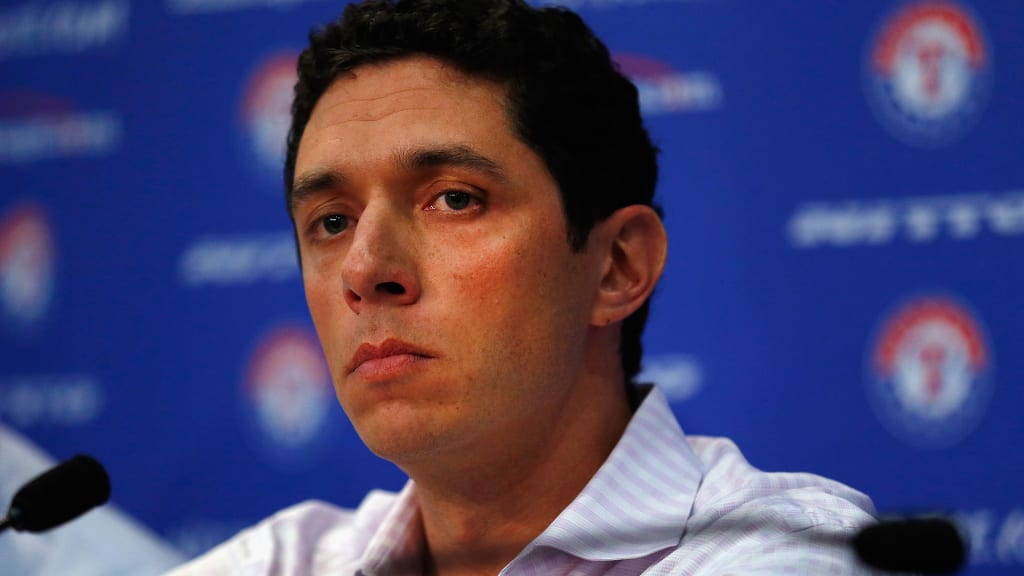 ARLINGTON, TX - SEPTEMBER 05: President of Baseball Operations and General Manager Jon Daniels of the Texas Rangers talks with the media after announcing the resignation of Manager Ron Washington at Globe Life Park in Arlington on September 5, 2014 in Arlington, Texas. Ron Washington informed the club that he has chosen to resign in order to turn his full attention to addressing an off-the-field personal matter. (Photo by Tom Pennington/Getty Images)