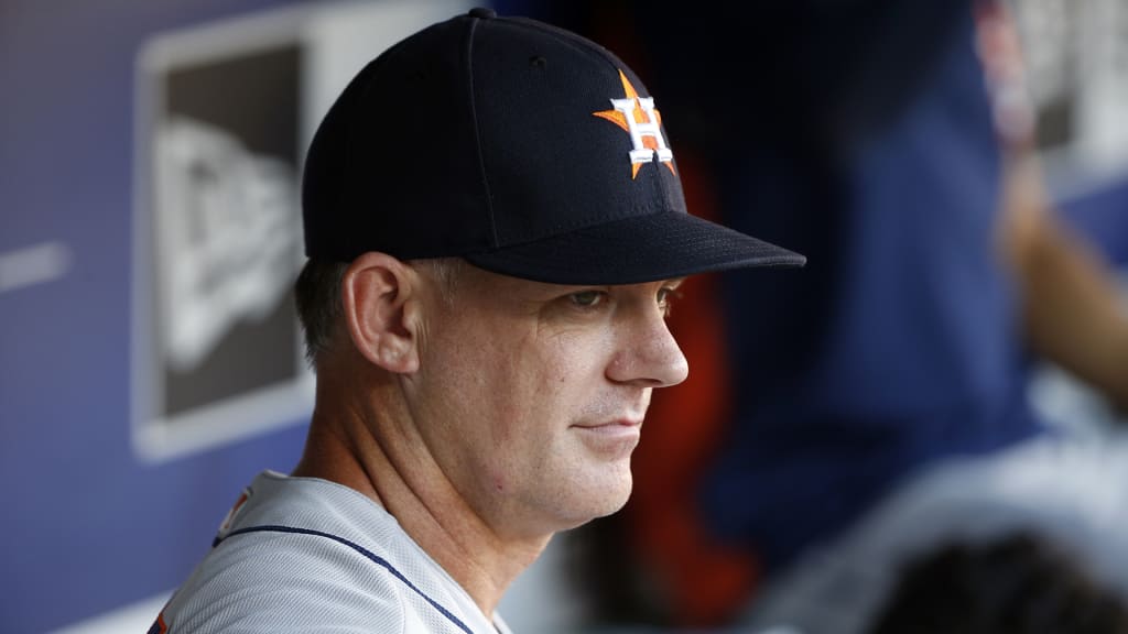 Houston Astros manager AJ Hinch (14) looks from the dugout prior to playing the Texas Rangers during a baseball game Saturday, June 9, 2018, in Arlington, Texas. (AP Photo/Michael Ainsworth)