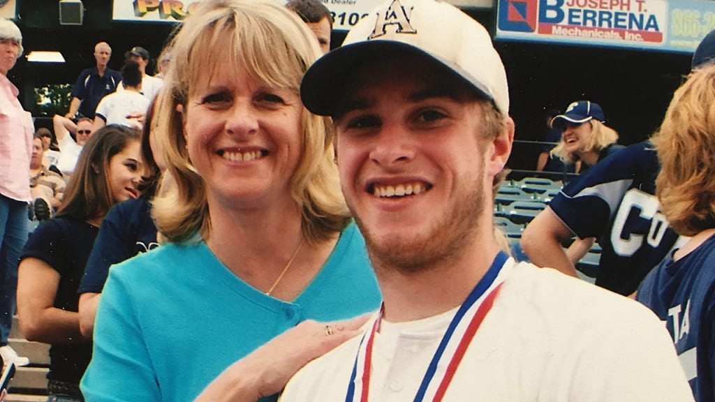 Cory Spangenberg and his mother, Lynne, celebrate the 2009 PIAA high school state championship.