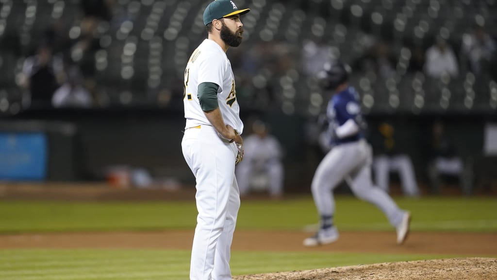 Oakland Athletics pitcher Lou Trivino pitching during the ninth