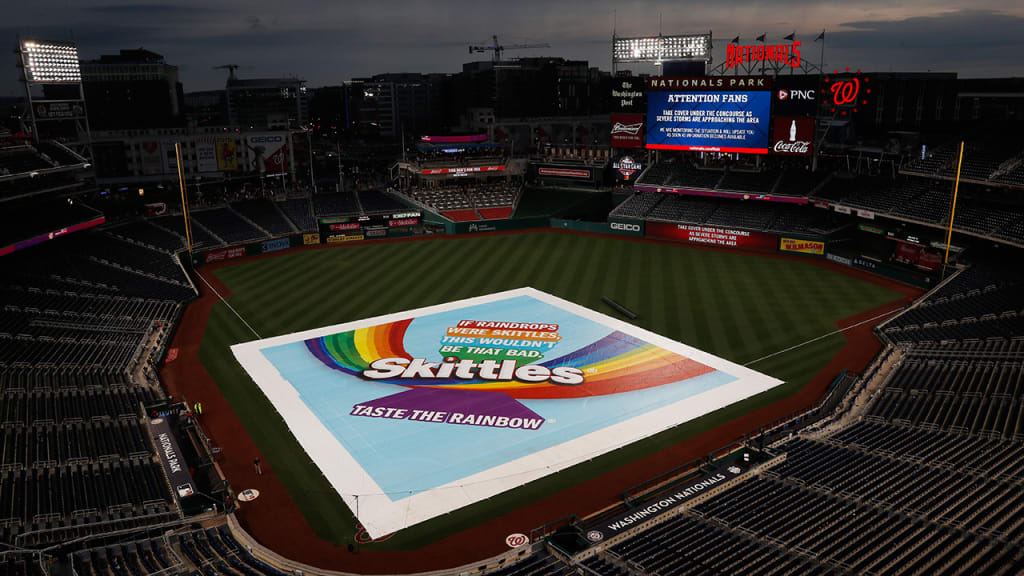 The tarp went onto the field due to approaching inclement weather. (AP)