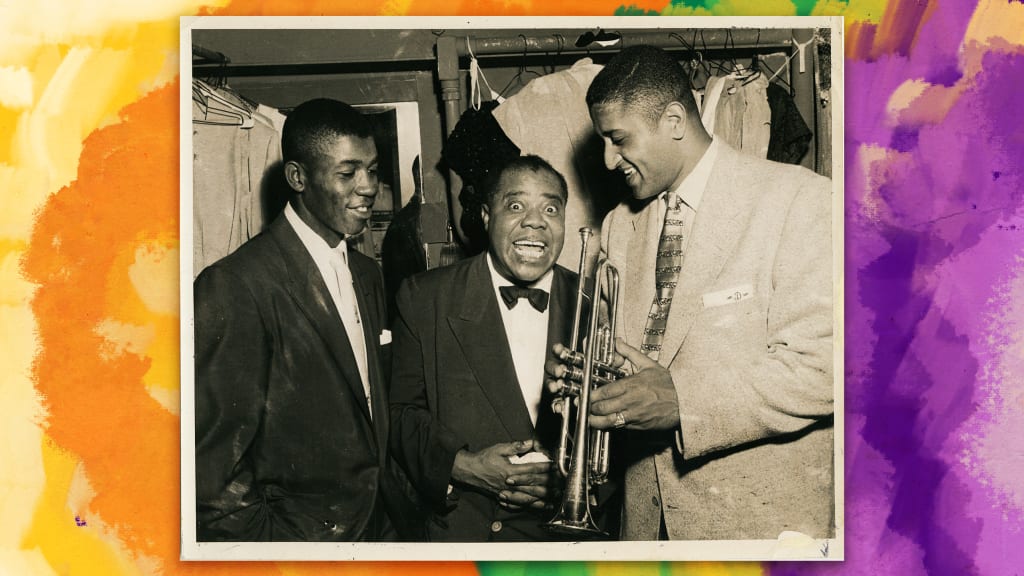 Armstrong with Dodgers Junior Gilliam and Don Newcombe. (Courtesy of the Louis Armstrong House Museum)
