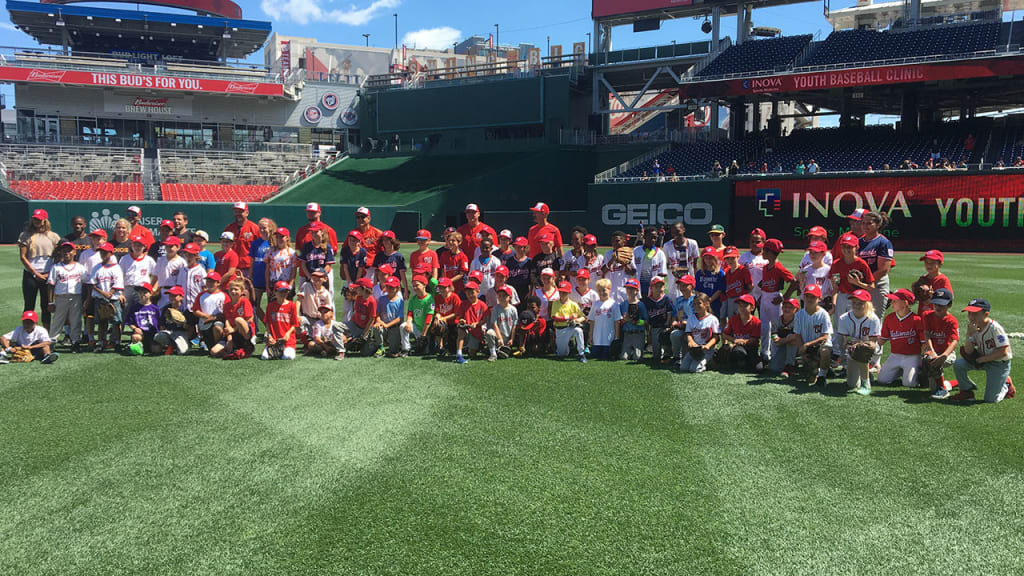 Around 60 kids gathered on the field of Nationals Park for drills and instruction from Nationals coaches. (Kyle Melnick)
