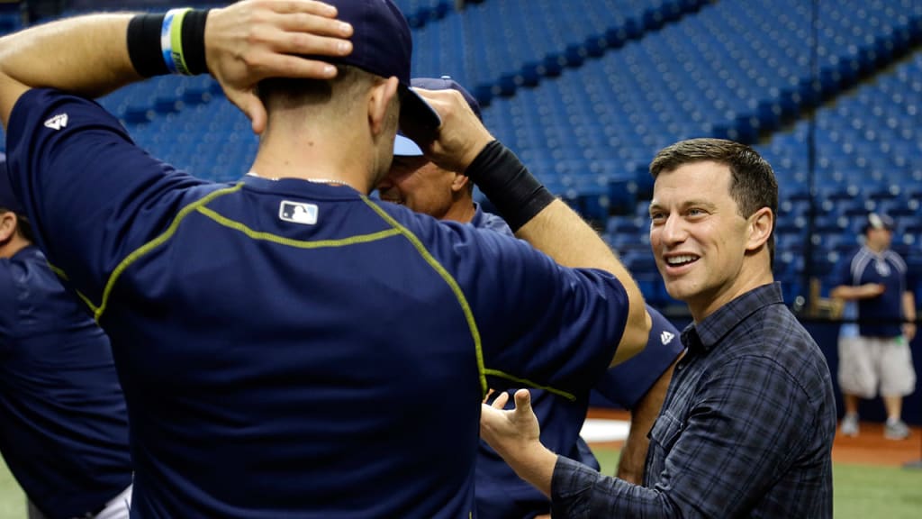 Dodgers president of baseball operations Andrew Friedman chats with Rays third baseman Evan Longoria ahead of Tuesday's game. (AP)