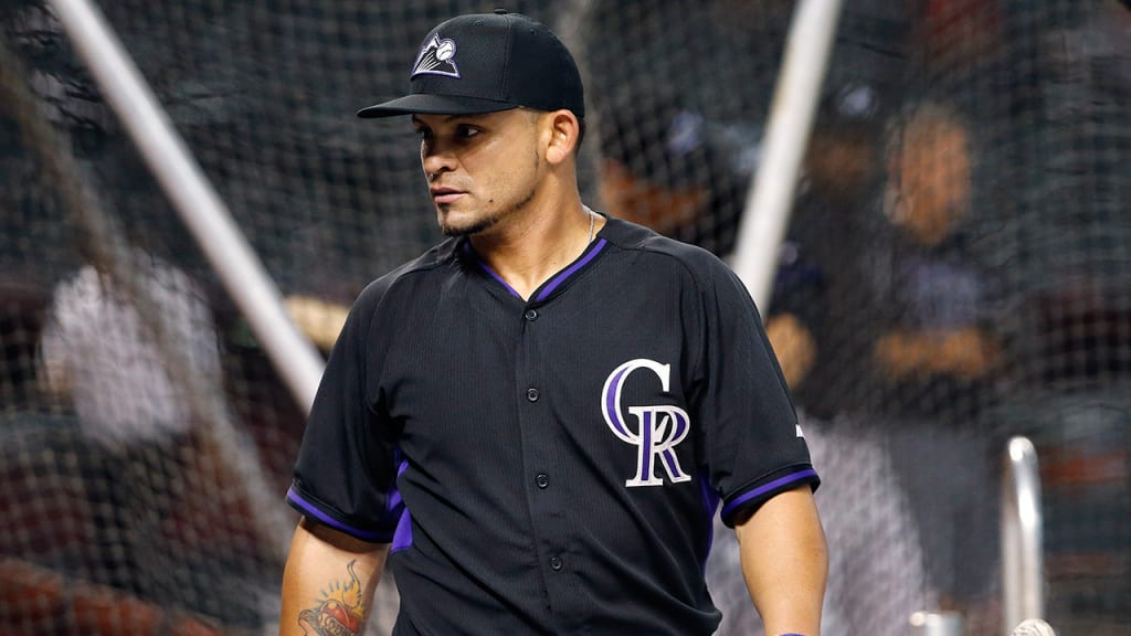 Gerardo Parra laced three doubles in his first game of a three-year, $27.5 million contract with the Rockies on Monday. (AP)