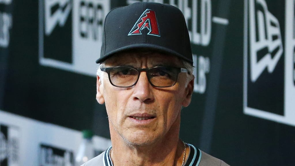D-backs' outfielder coach Dave McKay has devised a drill that starts with three outfielders flat on their backs, before they scramble to their feet to locate balls in the air. (Getty)
