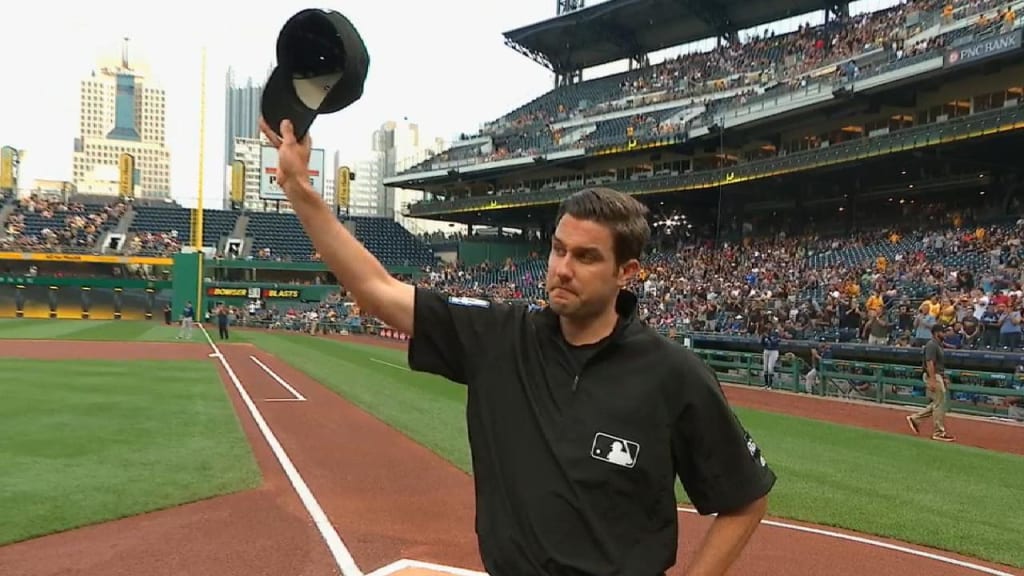 MLB umpire John Tumpane rescues woman on bridge