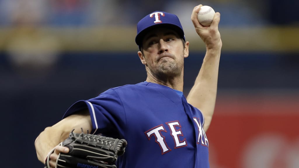 Texas Rangers starting pitcher Cole Hamels delivers to the Tampa Bay Rays during the first inning of a baseball game Wednesday, April 18, 2018, in St. Petersburg, Fla. (AP Photo/Chris O'Meara)