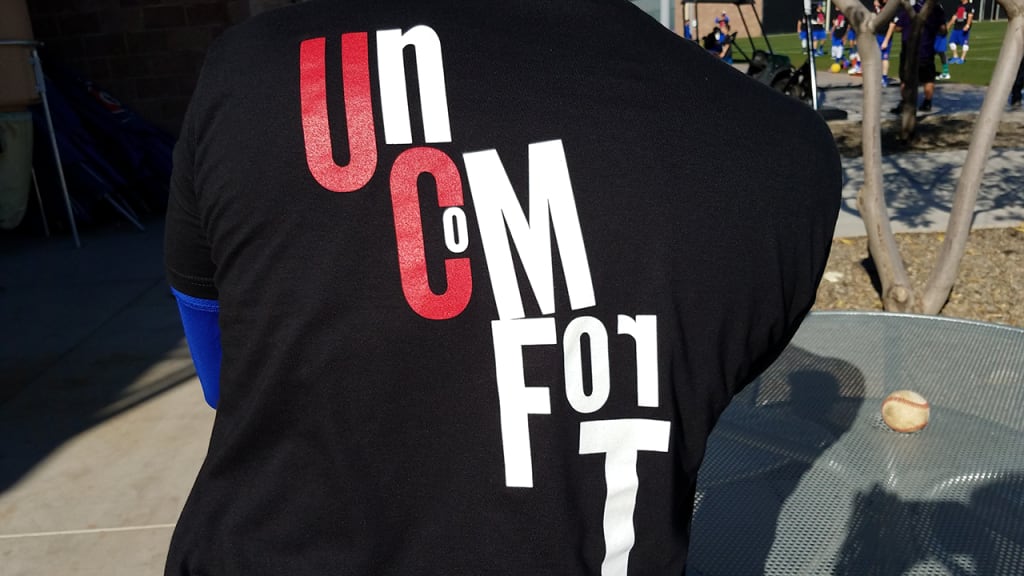 "The phrase 'uncomfortable' -- you write it down on a piece of paper and then start breaking the word down a little bit," Maddon said of the creative process. "I liked the 'able' part of 'uncomfortable' and wanted that on the front of the shirt." (Carrie Muskat/MLB)