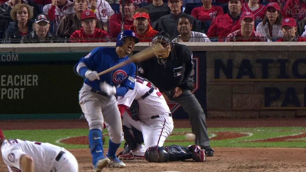 WASHINGTON, DC - OCTOBER 12: Chicago Cubs left fielder Jon Jay (30) slides  into third base on a wild pitch during game five of the NLDS between the  Washington Nationals and the