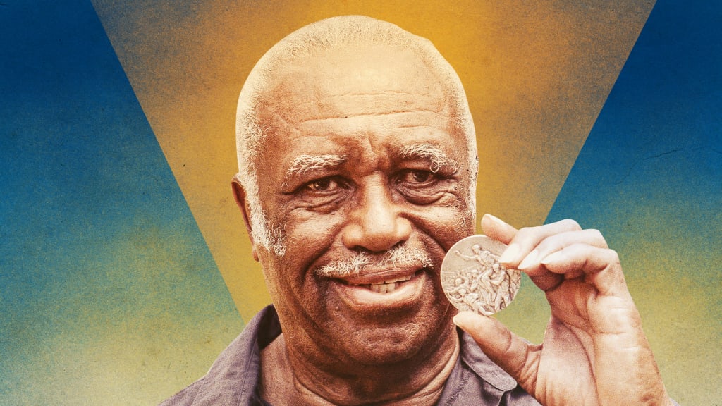 Mack Robinson with his silver medal.