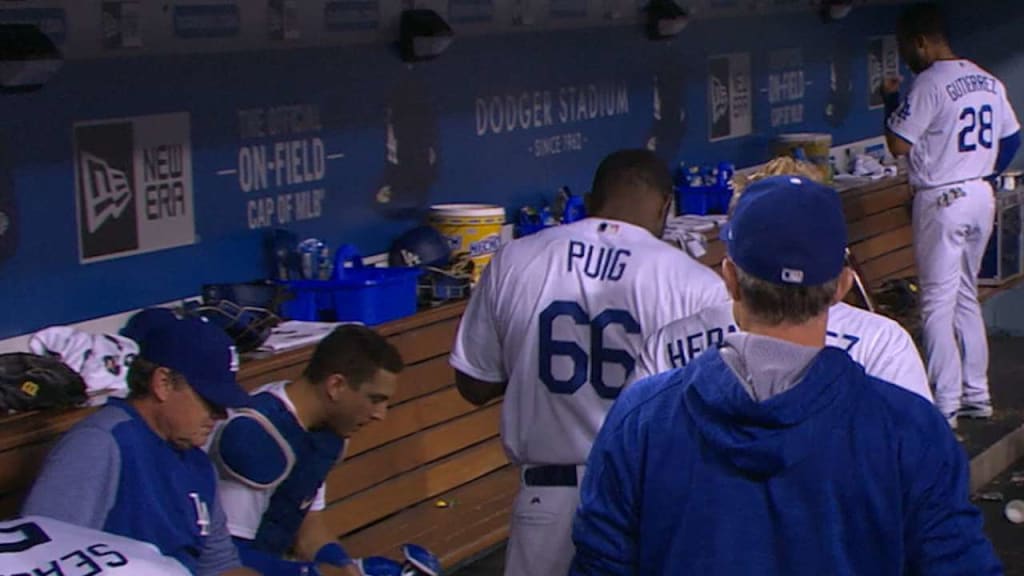 Yasiel Puig exits with upper back injury, but expected back in