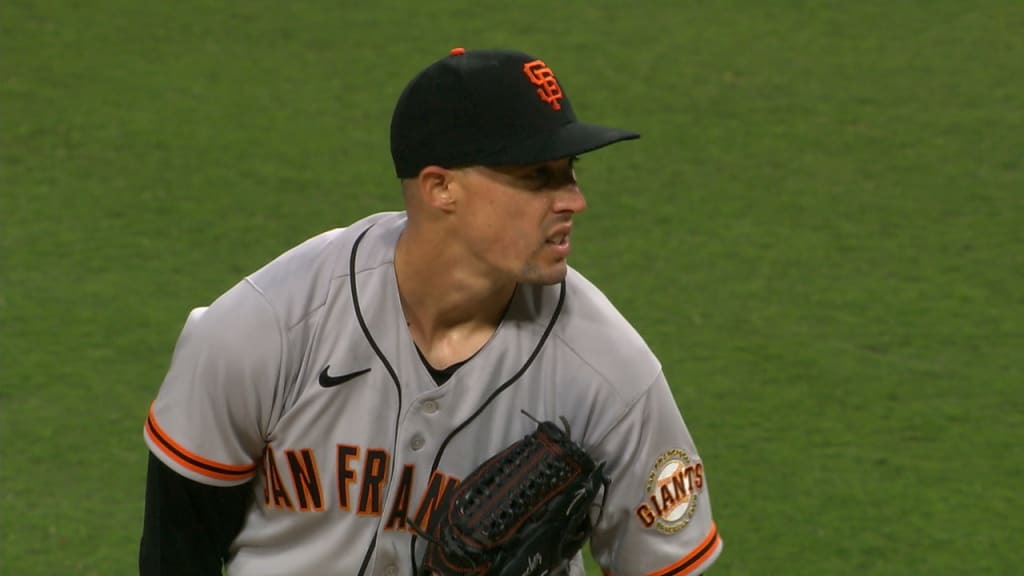 San Francisco Giants' Aaron Sanchez throws to first base during
