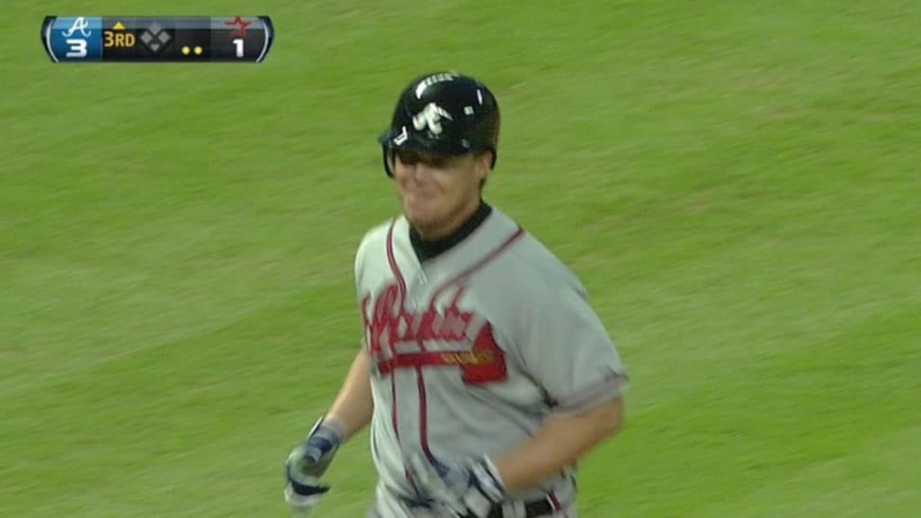 Atlanta Braves Mark Lemke (20) watches his game winning RBI single