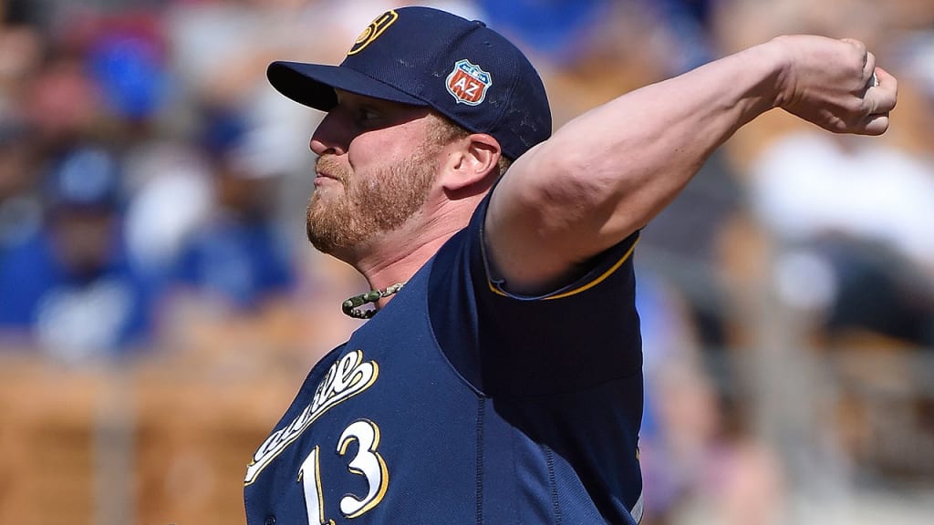 The Brewers want Will Smith to test his right knee in back-to-back outings before he rejoins the big league team. (Getty)