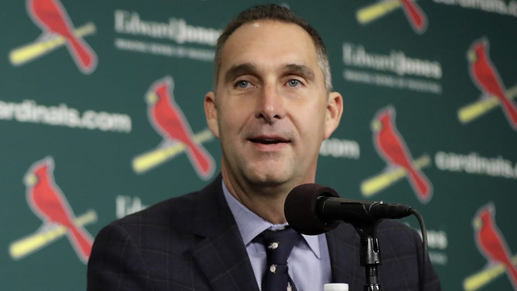 In this Friday, Dec. 9, 2016, photo, St. Louis Cardinals general manager John Mozeliak speaks during an introductory news conference announcing free agent center fielder Dexter Fowler has signed with the Cardinals in St. Louis. Mozeliak wants to avoid any notion that the Chicago Cubs winning the World Series is the driving force behind the St. Louis push to improve after missing the postseason for the first time since 2010. (AP Photo/Jeff Roberson)