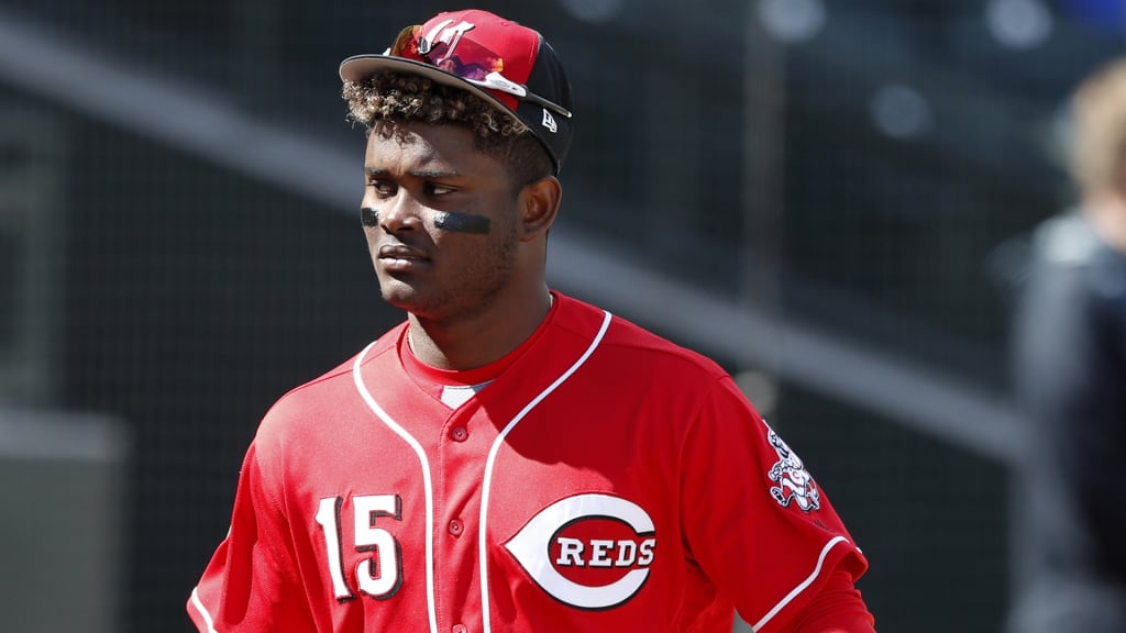 Cincinnati Reds' Dilson Herrera walks on the field before a spring training baseball game against the Kansas City Royals, Wednesday, Feb. 28, 2018, in Surprise, Ariz. (AP Photo/Charlie Neibergall)