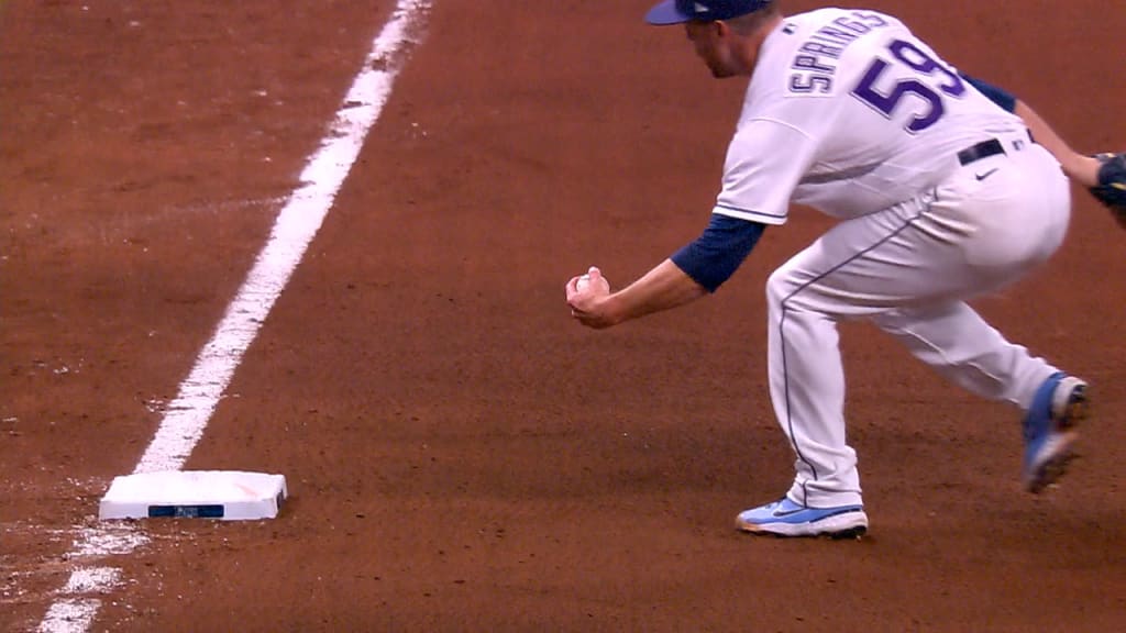 Wander Franco of the Rays hustles down to first base during the