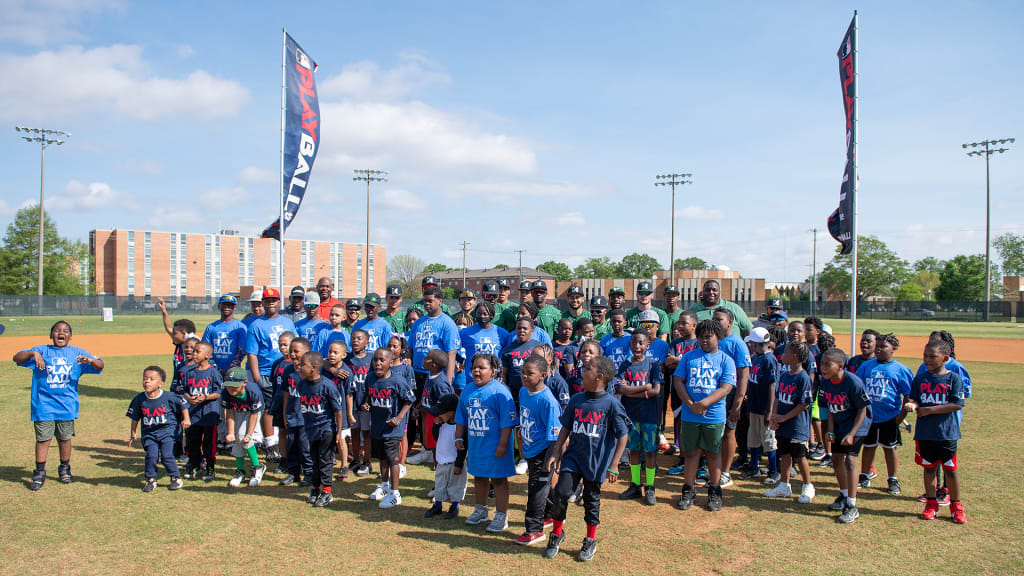 Participants pose for a photo before the Mississippi Valley State University PLAY BALL event at Lou Hamer Stadium on Saturday, April 30, 2022, in Itta Bena, Miss.
