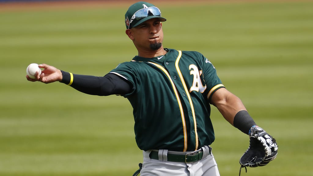 Oakland Athletics' Franklin Barreto throws against the Milwaukee Brewers during the second inning of a spring training baseball game Wednesday, March 21, 2018, in Phoenix. (AP Photo/Matt York)