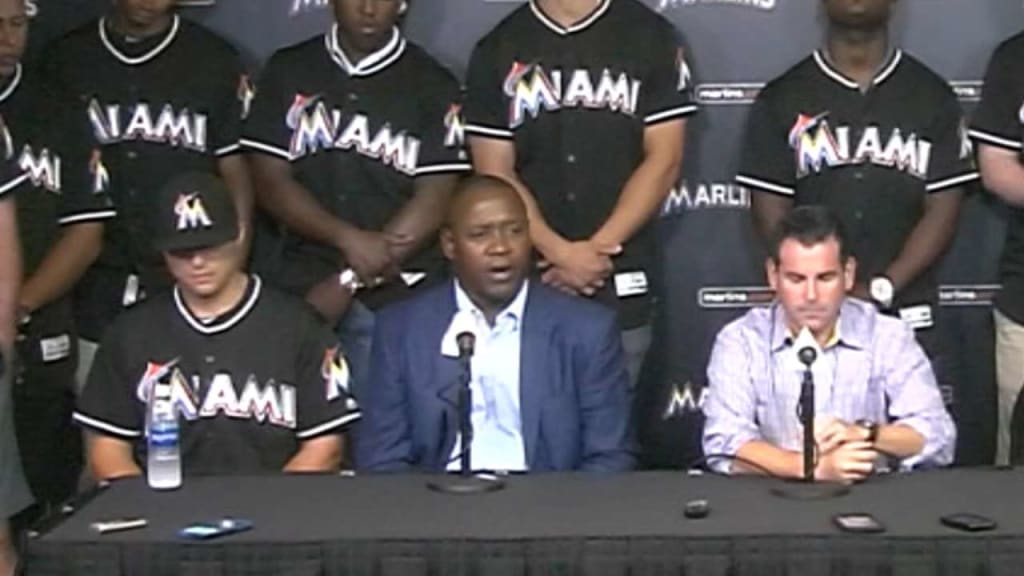 Miami Marlins pitcher Mike Dunn holds a Jose Fernandez jersey