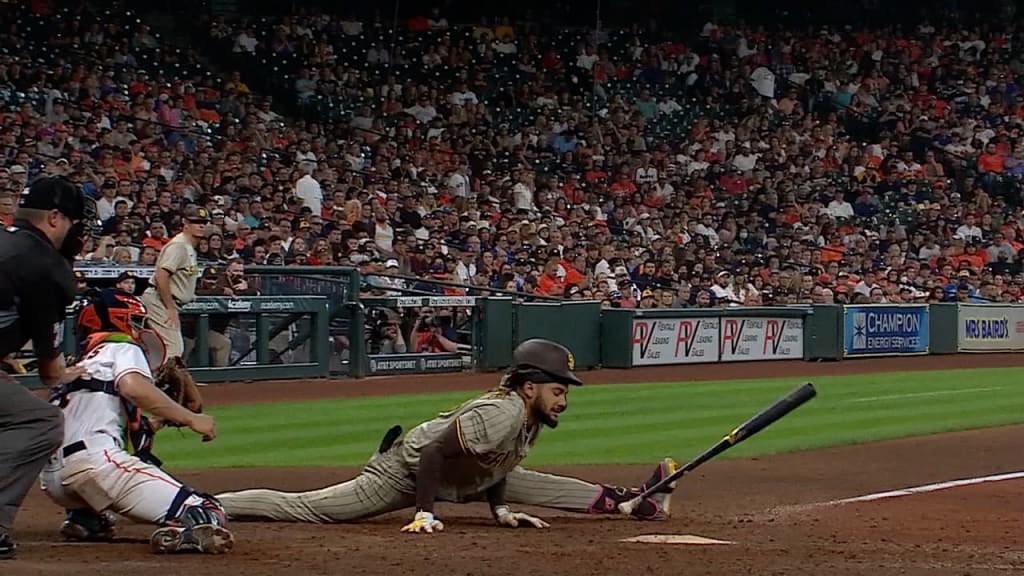 Tatis Jr. does a split to avoid HBP