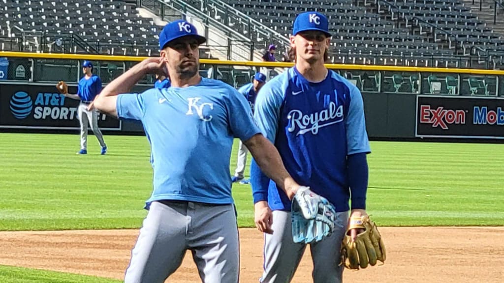 Whit Merrifield and Bobby Witt Jr. during pregame warmups on Saturday.