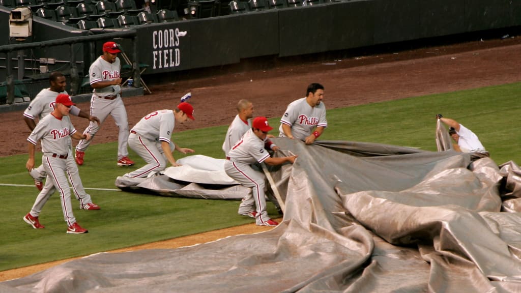 Wearing his umbrella hat, Blooper decided to take a dugout nap during the  Mets-Braves rain delay