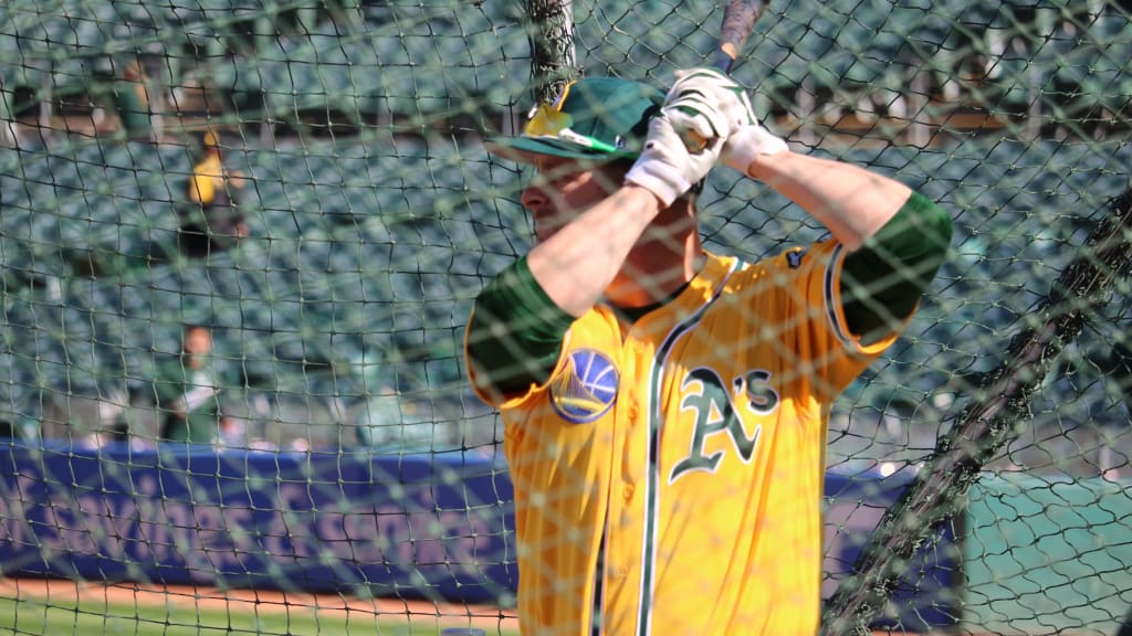 The A's showed love to their Oakland neighbors with Warriors-colored batting  practice jerseys