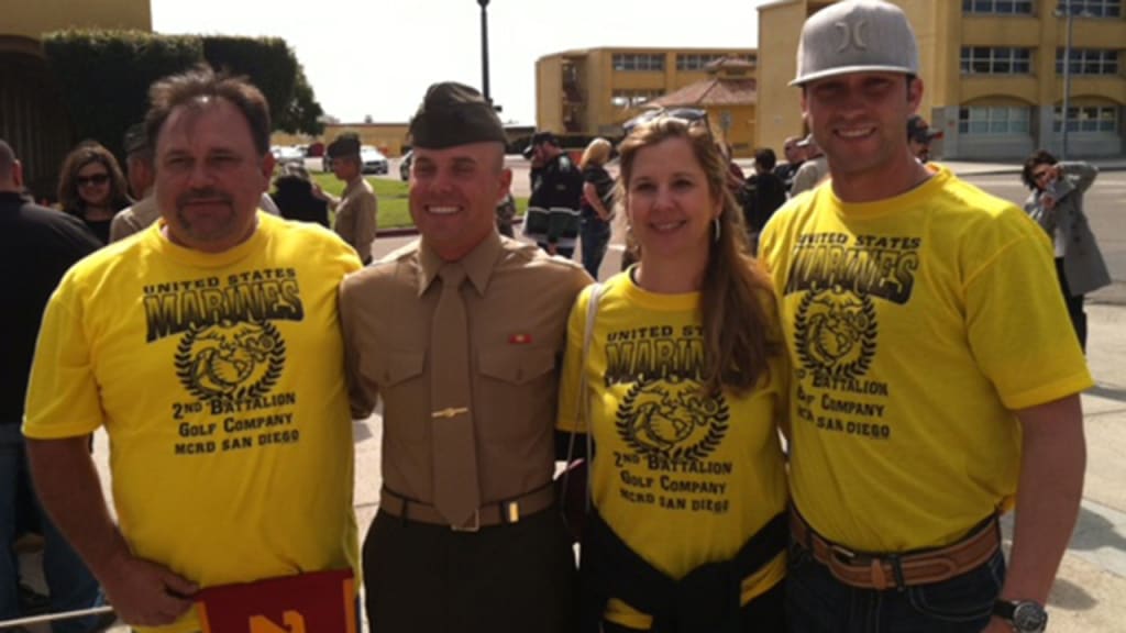 Tyler Naquin (far right), with mother Roanna, brother Zac and father Ken (far left). (Naquin Family)