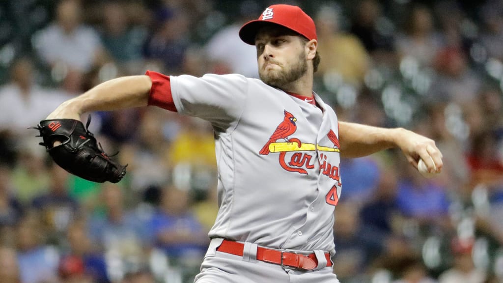 Cardinals reliever Kevin Siegrist did not retire any of the four batters he faced during the Brewers' four-run seventh inning. (AP)