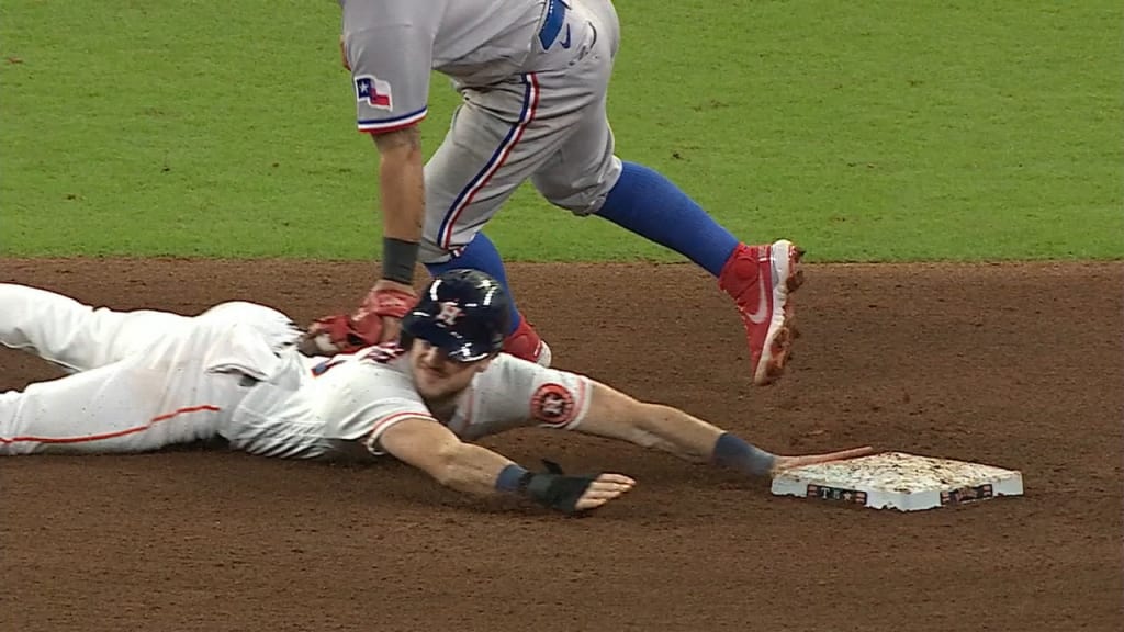 Miami Marlins catcher Jeff Mathis throws to first to put out San