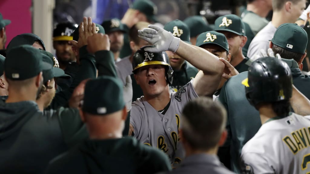 A's Khris Davis crushes home run while wearing jersey signed by