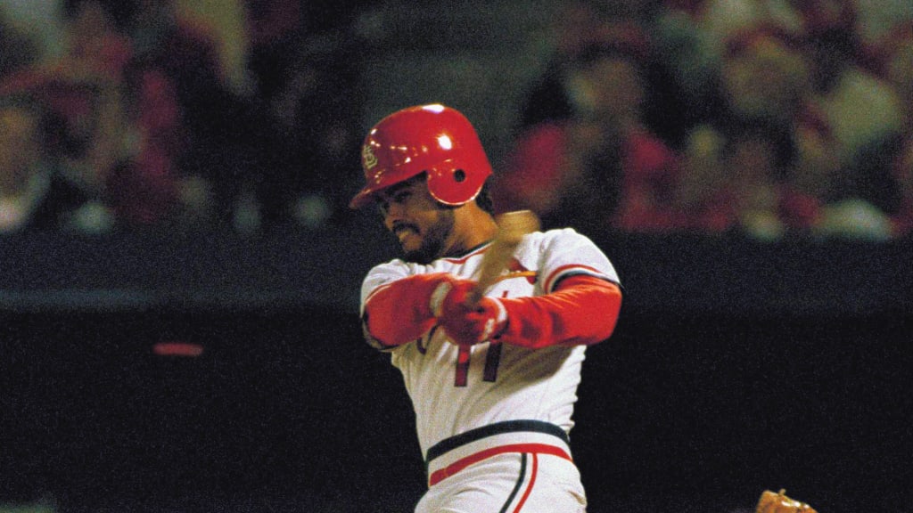 St. Louis Cardinals third base coach Jose Oquendo walks in the dugout  wearing the uniform of the St. Louis Stars of the Negro League before a  baseball game against the Pittsburgh Pirates