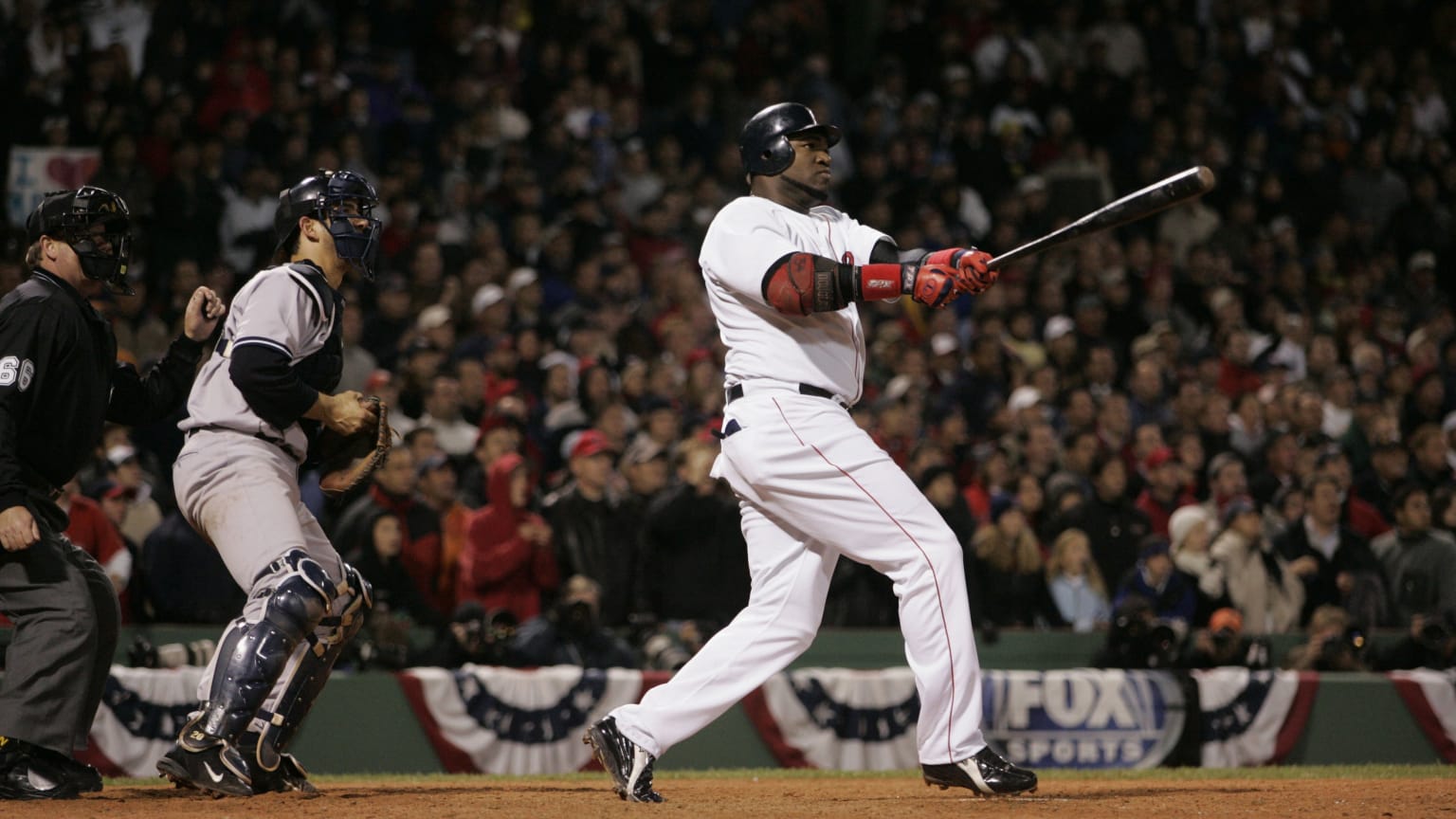 David Ortiz of the Red Sox watches a home run against the Yankees