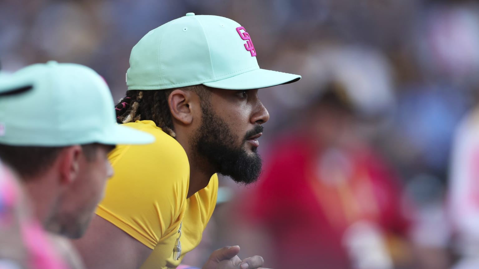 Fernando Tatis Jr. looks on from the dugout during a game