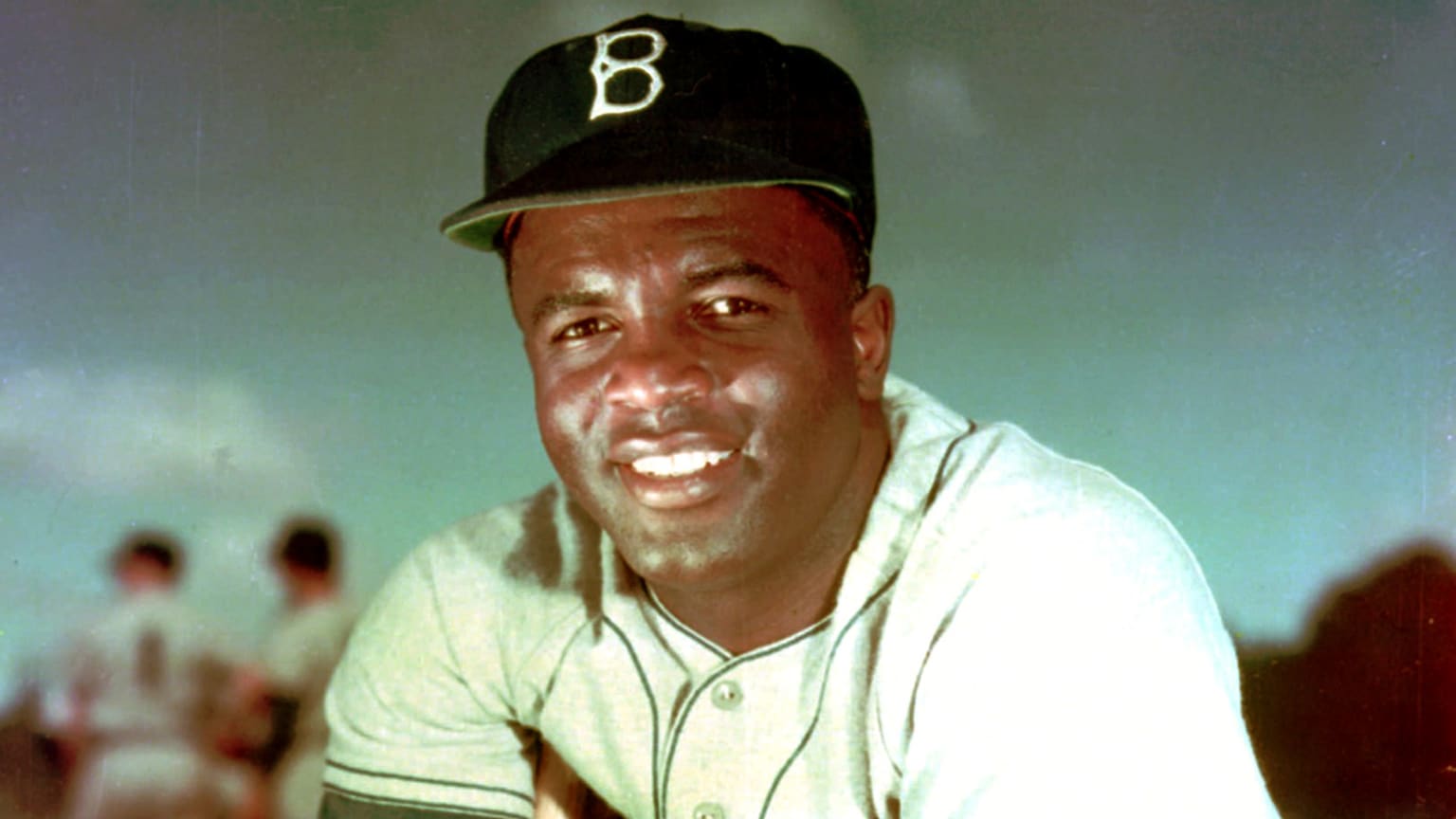 A color photo of Jackie Robinson in a Brooklyn Dodgers uniform