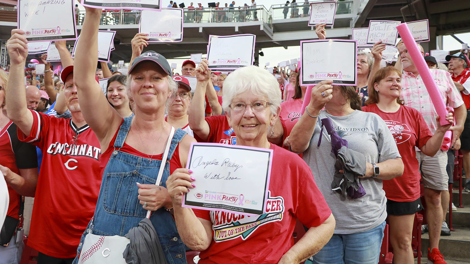 Cincinnati Reds - Reds baseball with a splash of pink.